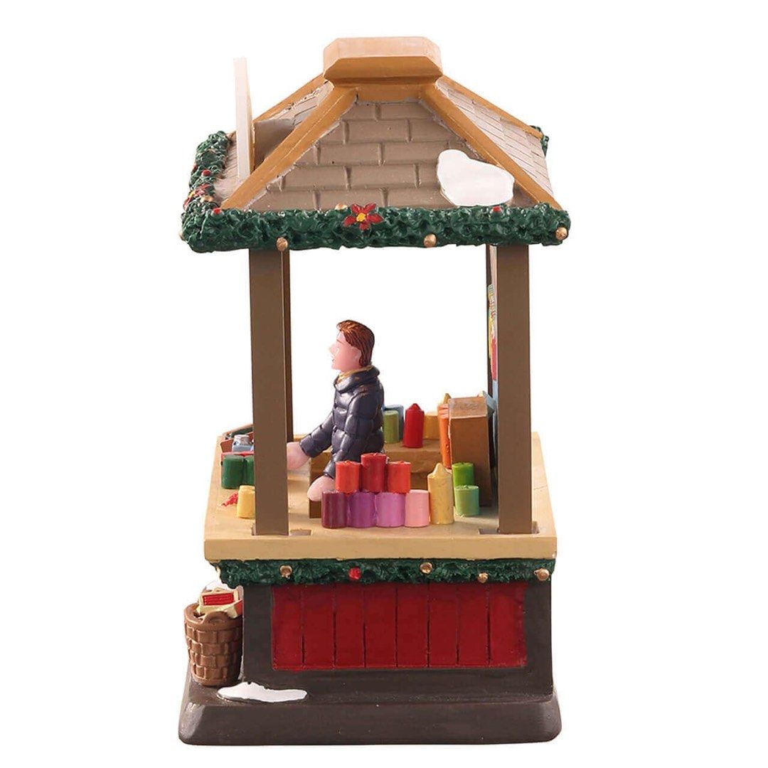 Lemax Natalie’s Candle Creations lighted (Category: Figurines & Statues) located in Santiago. Submitted by kitalpanga (Listing ID 1465057703, Image 3). Description: - Hand-painted miniature Christmas village candle shop stall - Features a festive vendor surrounded by colorful candles and hanging displays - Detailed design with snow-dusted roof, evergreen garlands, and poinsettia accents - Made of durable polyresin material - Great addition to hol