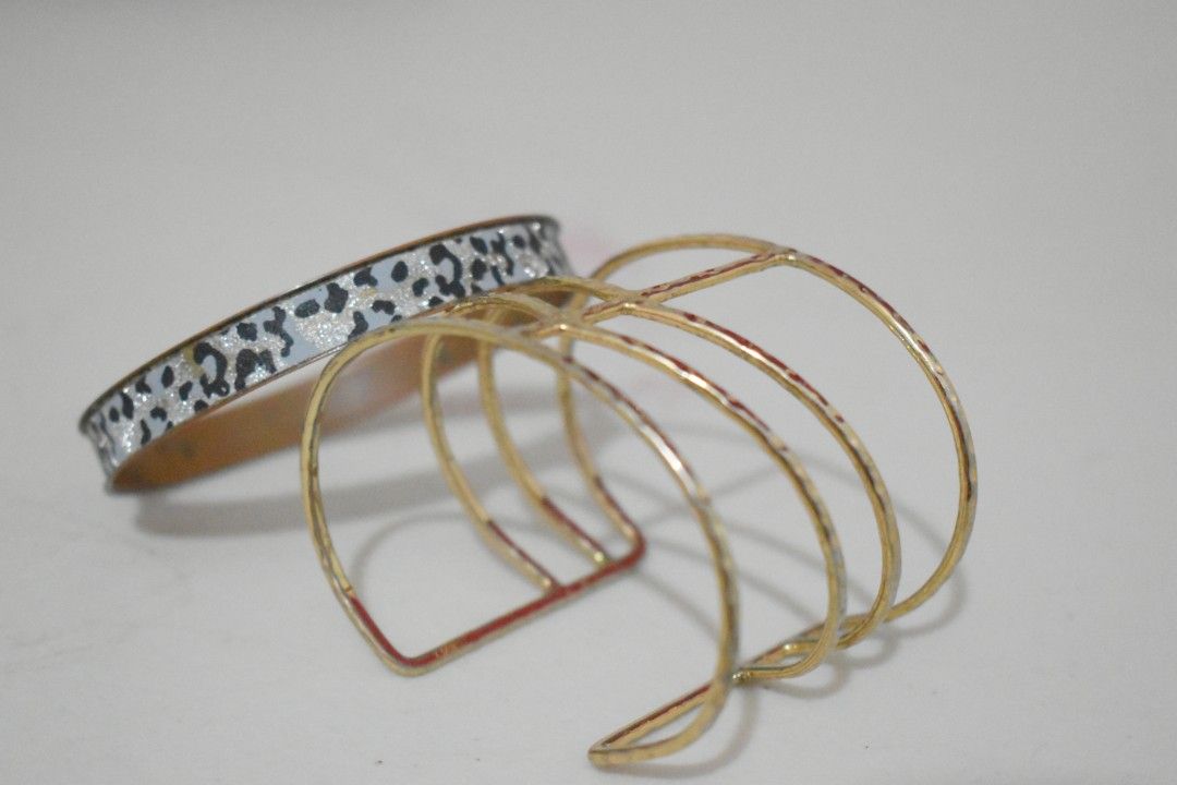 Leopard print bangle and gold cuff (Category: Bracelets) located in Manila. Submitted by pinknalalaki (Listing ID 1465094528, Image 1). Description: 2000s leopard print bangle from my mom -200₱ gold cuff -250₱ 400 for both.