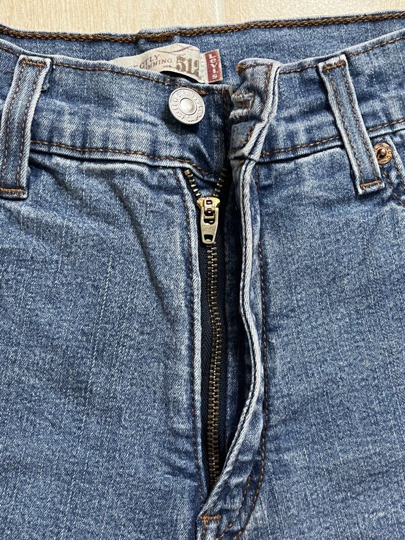 Levi's 512 Perfectly Slimming Jeans Size 8M (Category: Jeans) located in Quezon City. Submitted by juliacassandr4a (Listing ID 1465119439, Image 3). Description: - Brand: Levi's 512 Slim Jeans - Size: 8M (25) - Color/Wash: Mid Blue Wash - Material: 98% Cotton, 2% Spandex (with comfortable stretch) - Style: Slimming fit, classic five-pocket design, zip fly closure.