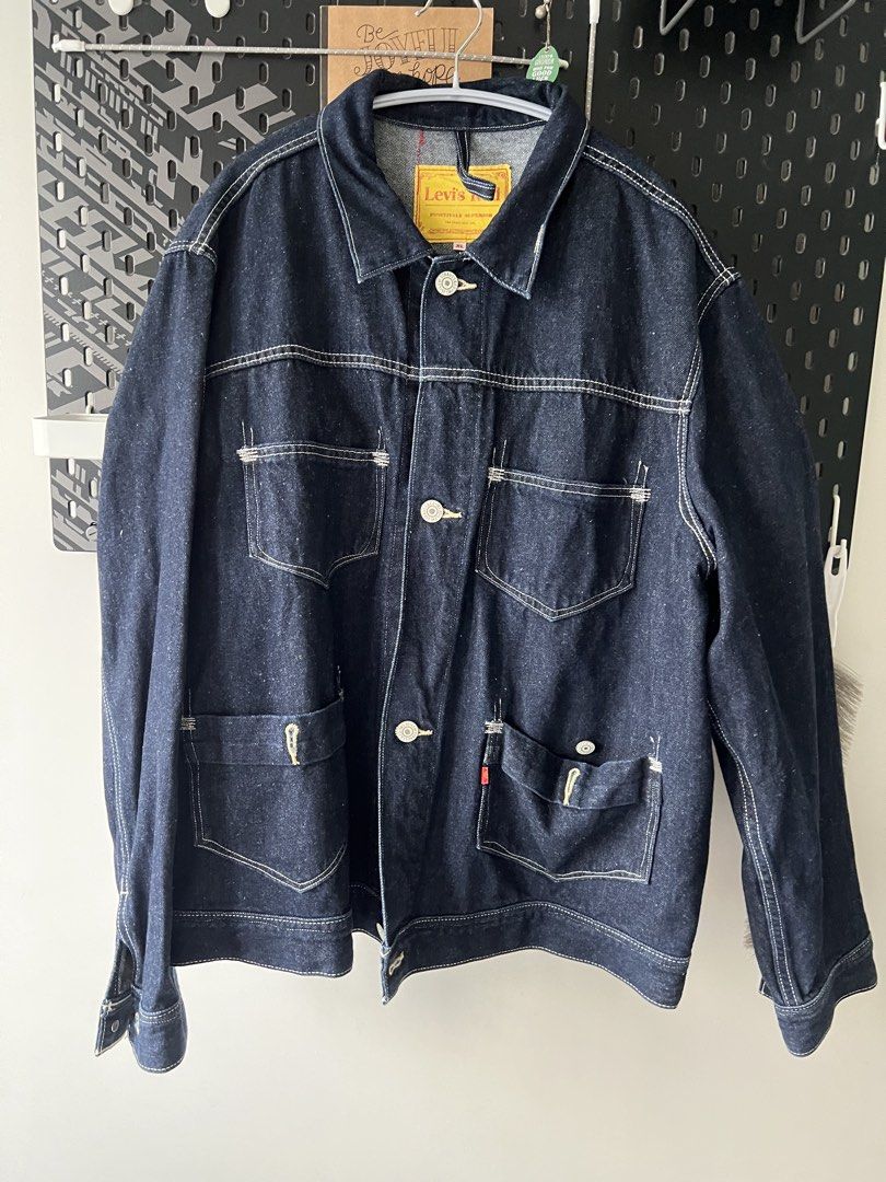 Levi's Red Positively Superior Denim Jacket XL (Category: Coats, Jackets and Outerwear) located in Manila. Submitted by russel_a (Listing ID 1465049095, Image 2). Description: - Brand: Levi's Red - Size: XL - Color/Wash: Dark wash denim with contrast stitching - Pockets: Multiple front utility pockets with flap closures - Details: Metallic buttons, iconic yellow interior brand label, and red tab on lower pocket - Style: Classic workwear silhouett