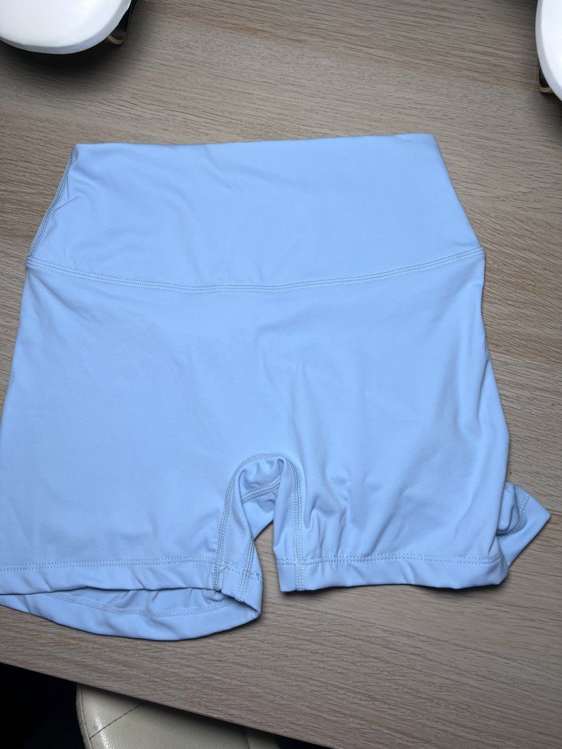 Light Blue High-Waisted Athletic Shorts (Category: Shorts) located in Meycauayan. Submitted by pausclosett (Listing ID 1465045285, Image 1). Description: - Color: Plain pastel light blue - Fit: High waistband for extra support and comfort - Material: Smooth, stretchy, and performance-ready fabric - Details: Clean stitching around the legs and crotch gusset - Versatility: Ideal for workouts, gym sessions, or casual lounging - Styling: Easily pairs