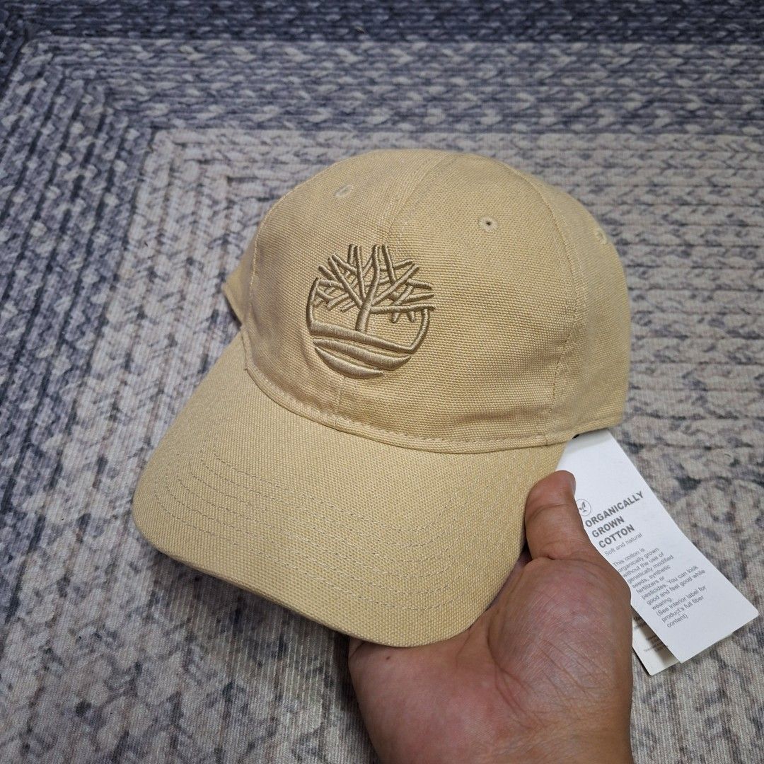 Light Brown big logo unstructured bucklestrap dad cap/hat by Timberland (Category: Caps & Hats) located in Balagtas. Submitted by capncaps09 (Listing ID 1464999803, Image 1). Description: Light Brown big logo unstructured bucklestrap dad cap/hat by Timberland organic cotton brand new legit 100% 550.