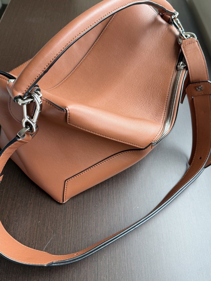 Loewe Puzzle Bag Large (Category: Luxury Bags & Wallets) located in Manila. Submitted by myclosetstylist (Listing ID 1465005337, Image 3). Description: Inclusion: Dustbag only Condition: Well-used I like my loewe puzzles slouchy Size comparison w/ Macbook M1 Pro 14” .