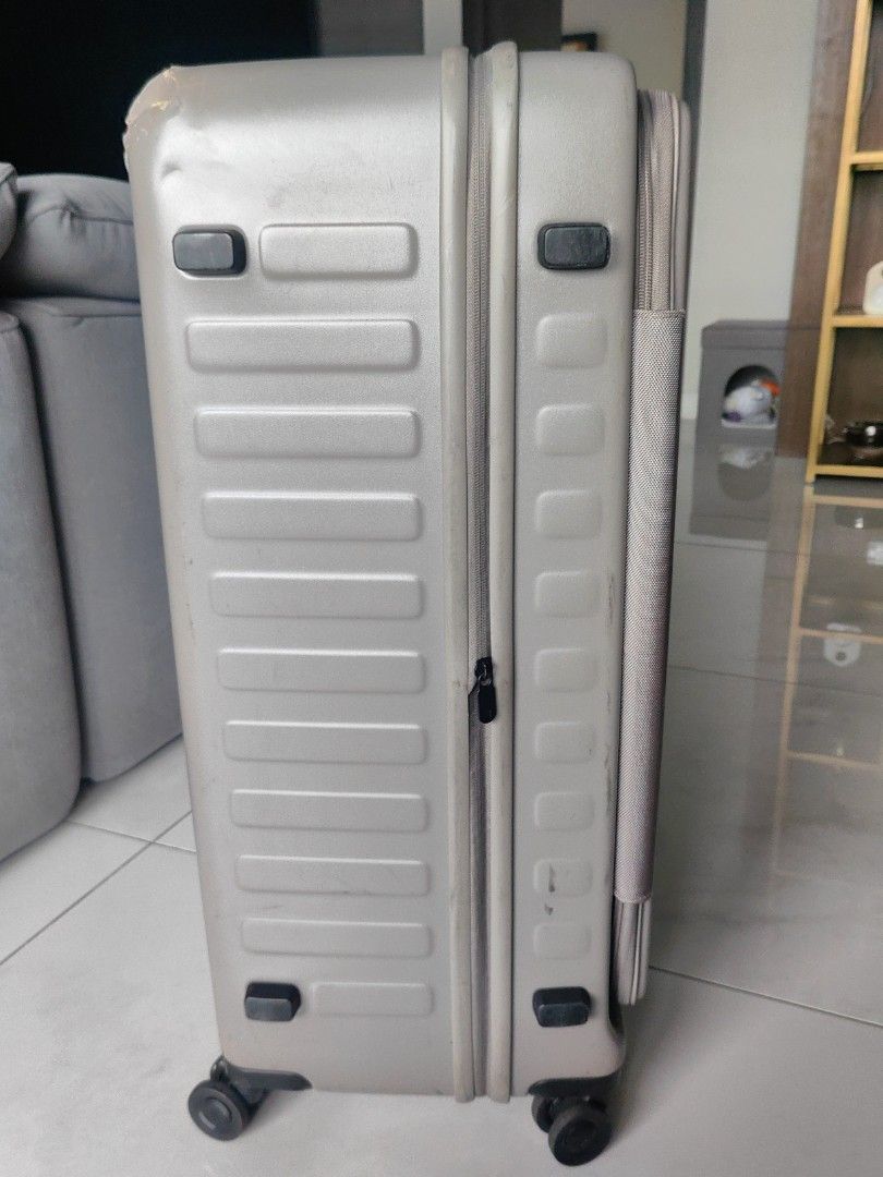 LOJEL grey hard-shell luggage suitcase with TSA lock (Category: Luggage) located in Makati City. Submitted by kruelscloset (Listing ID 1464989002, Image 3). Description: LOJEL hard-shell luggage in grey. Includes a built-in TSA combination lock and smooth rolling wheels. Solid carry capacity for trips. Normal scuffs from travel use, everything works properly..