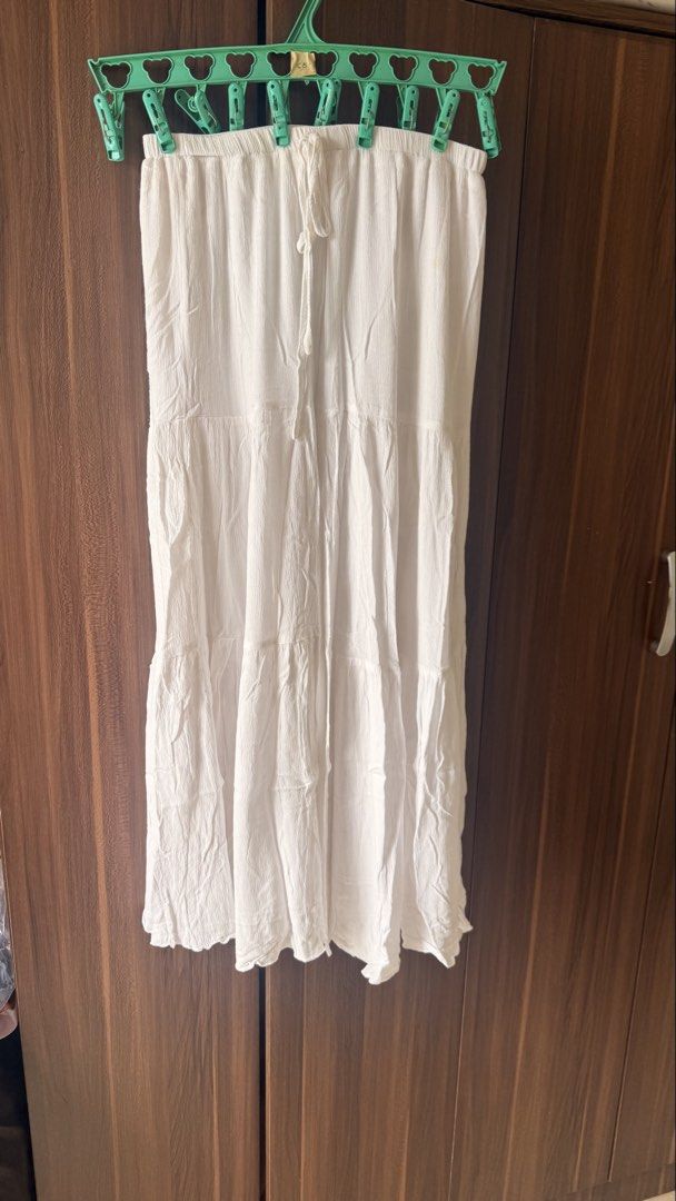 Long White Tiered Skirt (Category: Skirts) located in Makati City. Submitted by chie_3030 (Listing ID 1465000285, Image 2). Description: Size Reference: height: 5’4” waist: 28in Listed Item: - white - long skirt - tiered skirt - not sheer - with long inner lining - garterized waist.