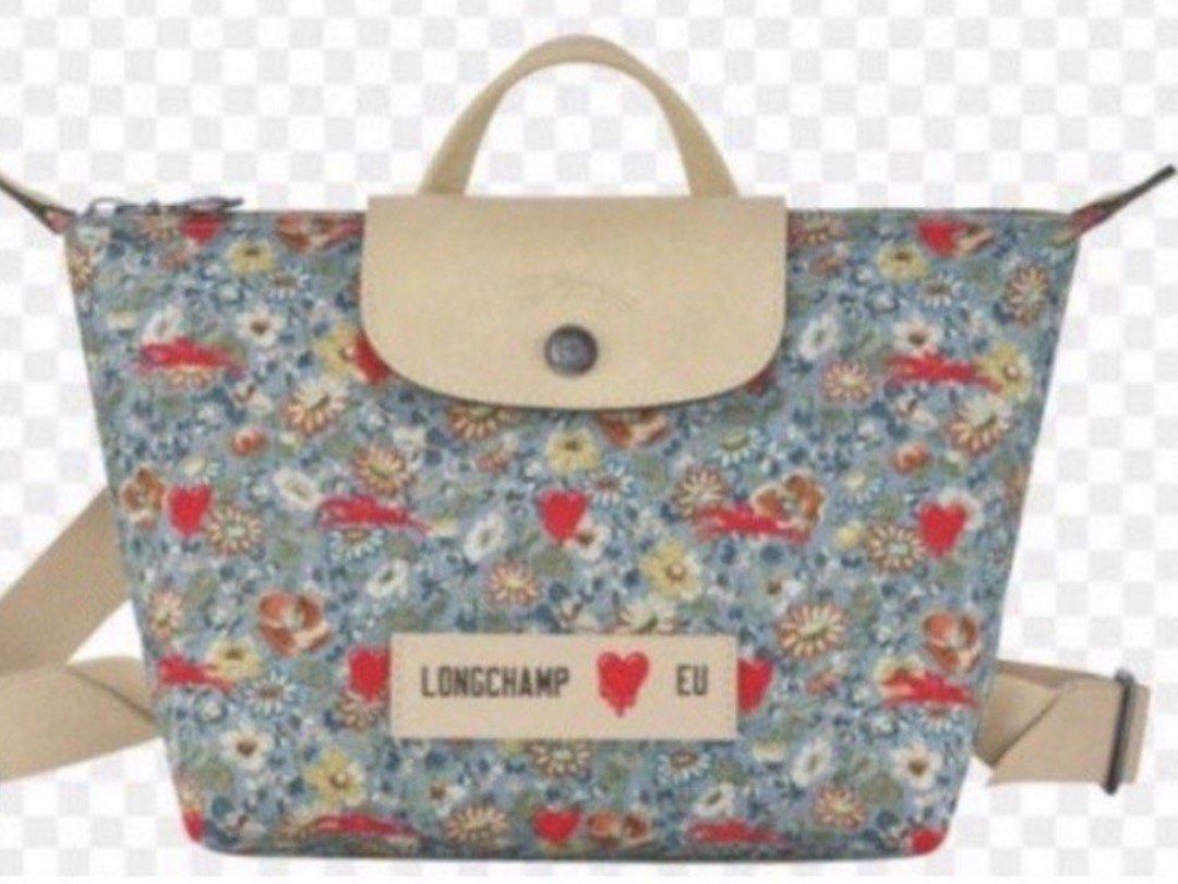 Longchamp backpack (Category: Backpacks) located in Manila. Submitted by bwshoppe (Listing ID 1464985541, Image 1). Description: Brand new LONGCHAMP floral design backpack- Size:Small (7”x12” approximately) Comes with care card . Limited edition Purchased from US. Original price @ $211 (php11k+) Fossil Messenger sling bag.made of soft leather. Slightly used & in mint condition. Multiple compartments including a laptop sleeve.. Size: 12”x 17” appr