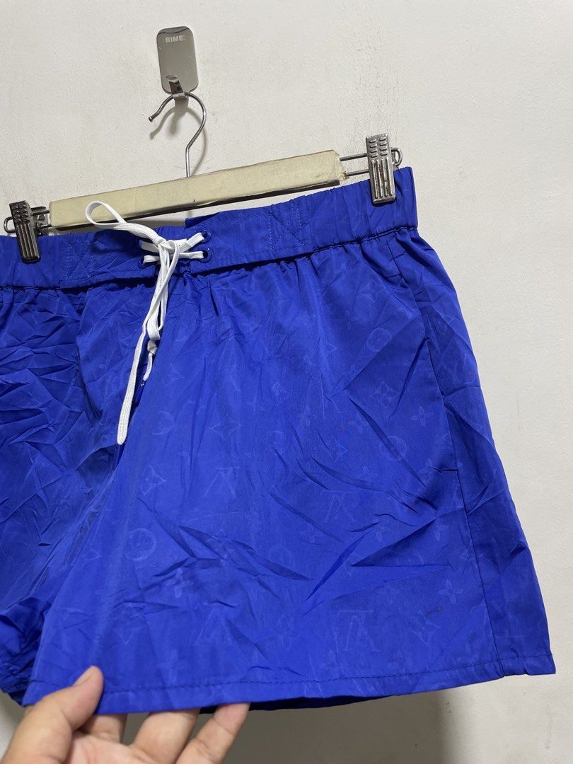 Louis Vuitton Blue Monogram Swim Shorts (Category: Shorts) located in Santiago. Submitted by UkayLuxxSelector (Listing ID 1465074368, Image 2). Description: - Brand: Louis Vuitton - Color/Design: Blue with all-over tonal monogram pattern - Waist: Adjustable drawstring with white cords (fits size 28-32) - Length: 13 inches - Lining: Comfortable white mesh interior - Mode of Payment: GCash, BPI, or Bank Transfer -.