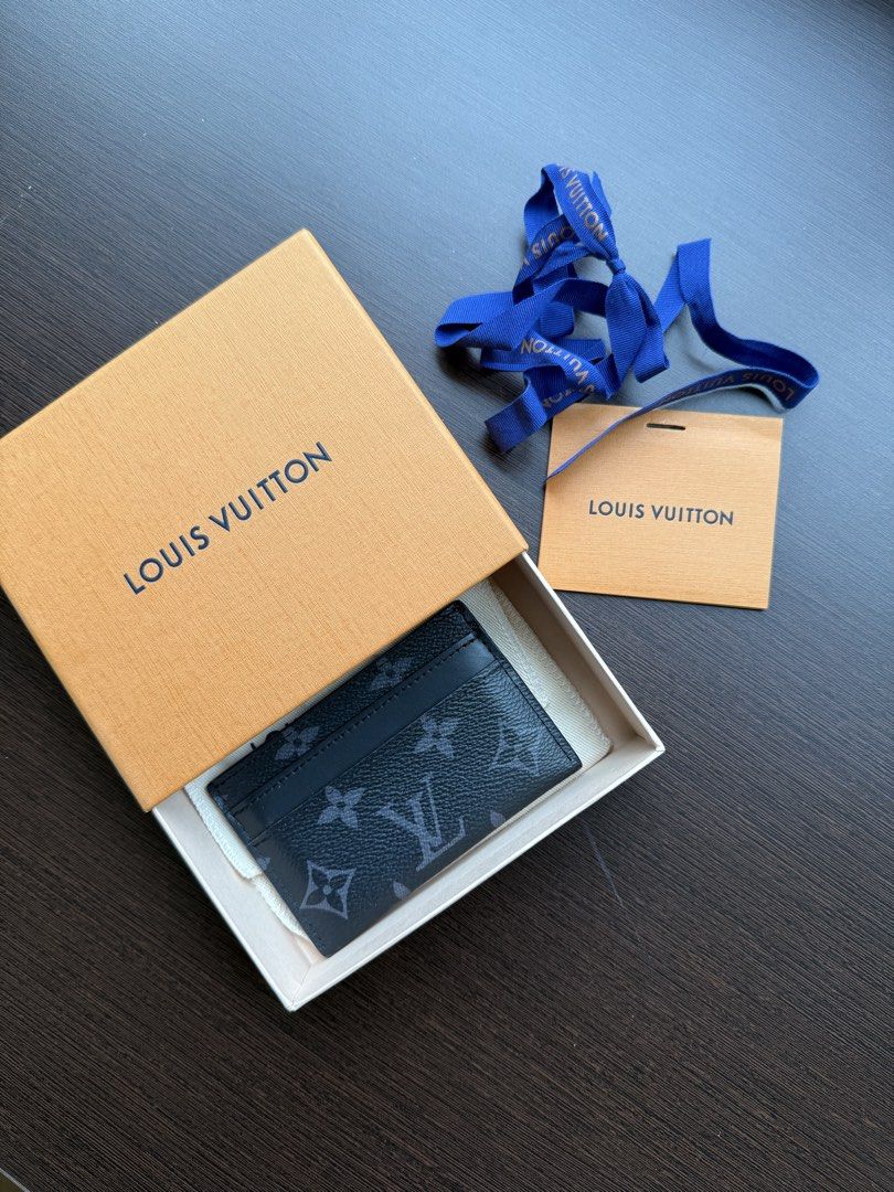 Louis Vuitton Card Holder (Category: Luxury Bags & Wallets) located in Manila. Submitted by myclosetstylist (Listing ID 1465004845, Image 1). Description: Authentic Louis Vuitton Monogram Eclipse card holder in black canvas. Bought in Greenbelt 3. Features multiple card slots and a slim profile. Comes with original box, dust bag, and ribbon. Perfect for daily use or gifting..