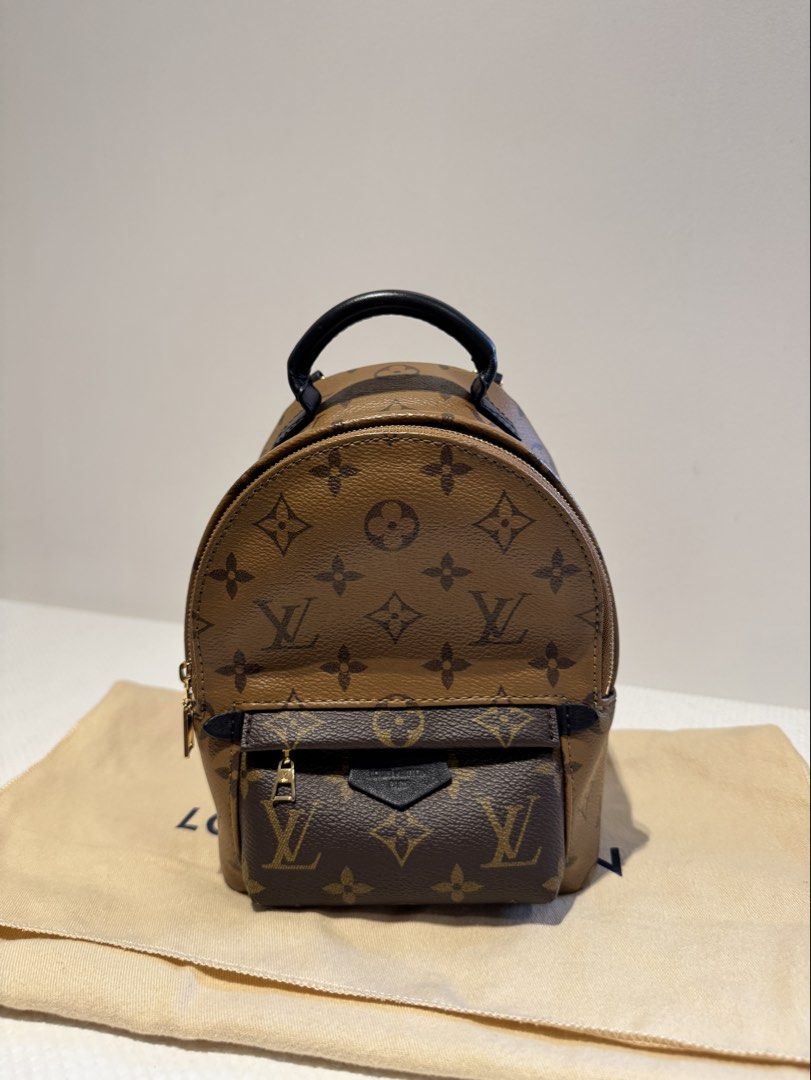 Louis Vuitton Palm Springs Mini Backpack Monogram (Category: Luxury Bags & Wallets) located in Manila. Submitted by mctrl (Listing ID 1465001834, Image 1). Description: - Authentic Louis Vuitton Palm Springs Mini backpack - Iconic Monogram canvas with dark leather top handle and gold-tone hardware - Front zipped pocket and secure wrap-around zip closure - Comes with removable multi-way black leather straps - Includes original dust bag - Surprisin