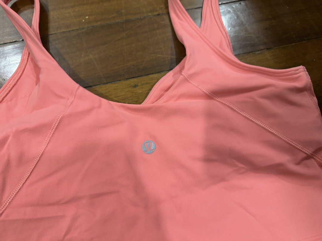 Lululemon Align Tank Size 10 Salmon Pink (Category: Activewear) located in Quezon City. Submitted by charlieschamps (Listing ID 1465091890, Image 3). Description: RFS: No longer doing yoga and pilates Size 10 no tag Pads included Payment via Gcash J&T shipping c/o buyer.