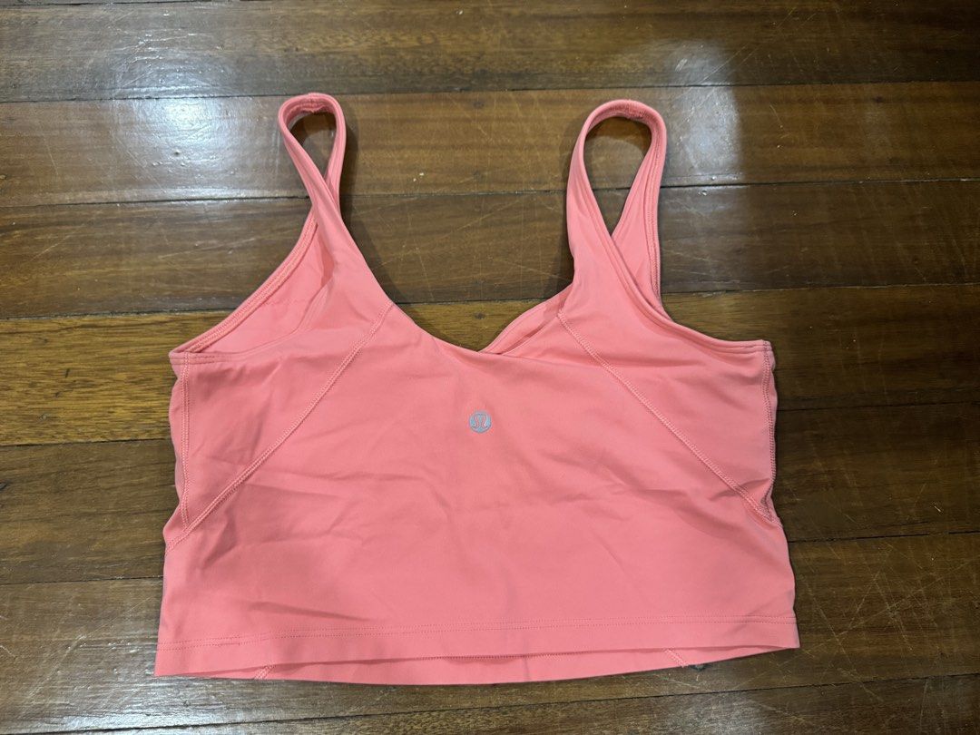 Lululemon Align Tank Size 10 Salmon Pink (Category: Activewear) located in Quezon City. Submitted by charlieschamps (Listing ID 1465091890, Image 2). Description: RFS: No longer doing yoga and pilates Size 10 no tag Pads included Payment via Gcash J&T shipping c/o buyer.