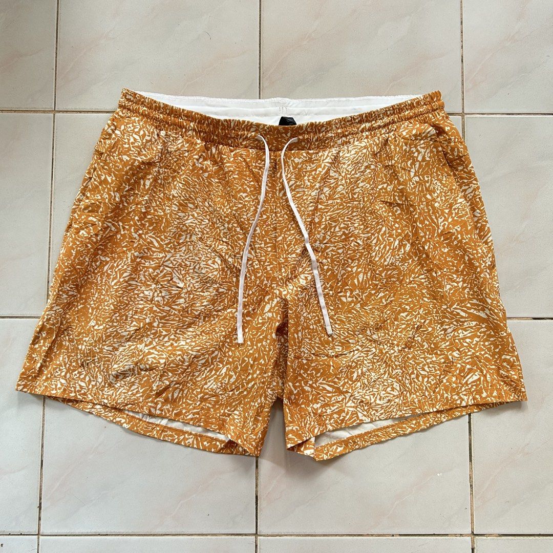 Lululemon Men's Patterned Athletic Short 🔥 (Category: Shorts) located in Jinoba-an. Submitted by eegiboy (Listing ID 1465006753, Image 3). Description: - Brand: Lululemon - Size: XXL - Color/Design: Mustard yellow with white abstract print - Features: Inner mesh liner, elastic waistband with white drawstring, and a secure zipped pocket - Material: Lightweight and breathable - Condition: Great for workouts or casual days Wts: lululemon short 🥵 F