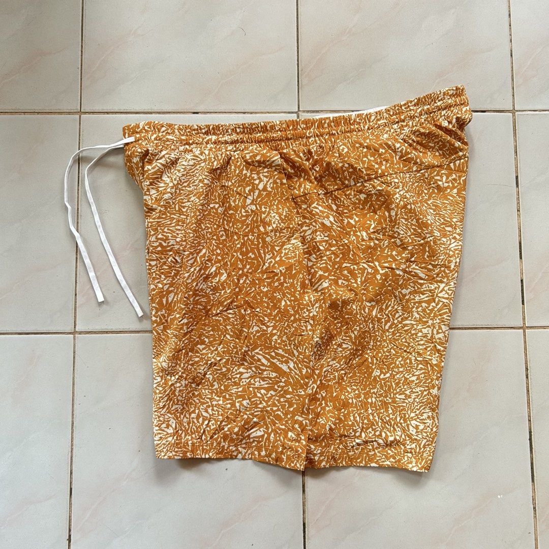 Lululemon Men's Patterned Athletic Short 🔥 (Category: Shorts) located in Jinoba-an. Submitted by eegiboy (Listing ID 1465006753, Image 1). Description: - Brand: Lululemon - Size: XXL - Color/Design: Mustard yellow with white abstract print - Features: Inner mesh liner, elastic waistband with white drawstring, and a secure zipped pocket - Material: Lightweight and breathable - Condition: Great for workouts or casual days Wts: lululemon short 🥵 F