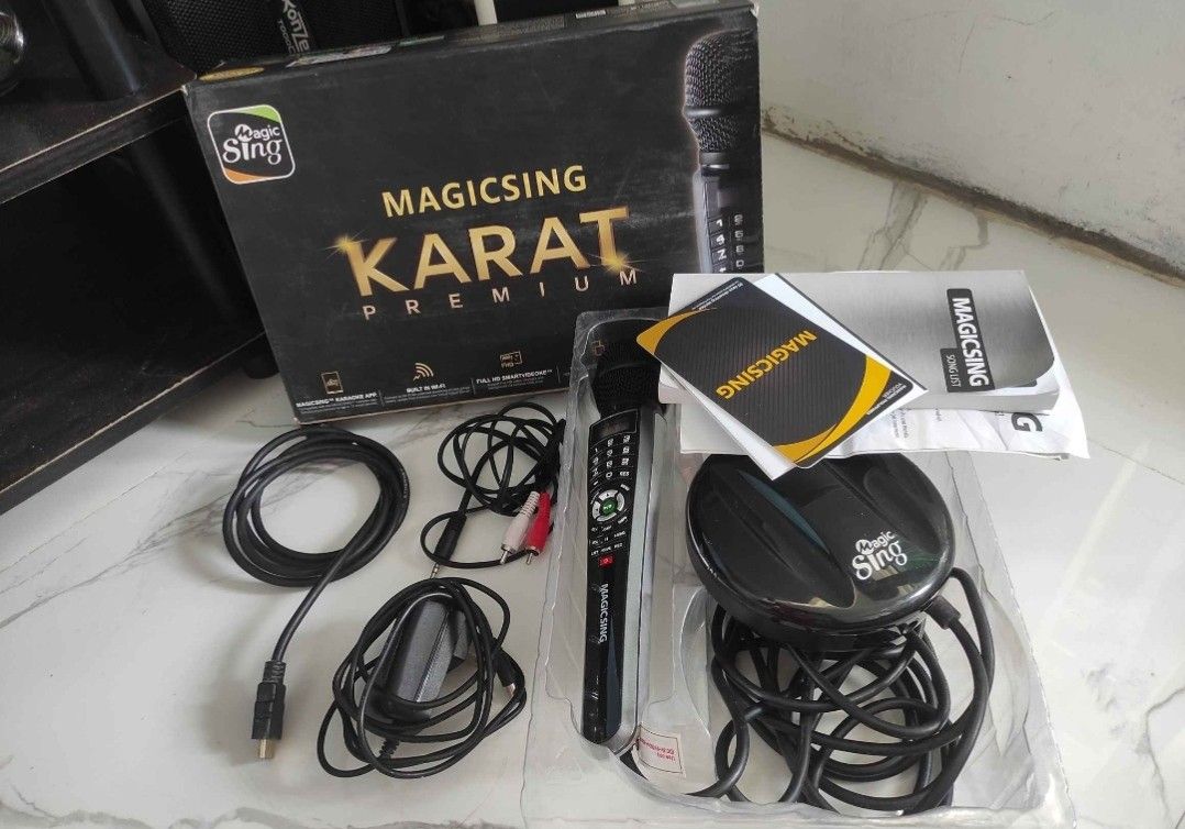 MagicSing w/ free konzert ampli.& speaker (Category: Soundbars, Speakers & Amplifiers) located in Manila. Submitted by jefferlyn30 (Listing ID 1465079403, Image 1). Description: - Complete MagicSing Karat Premium karaoke system set - Includes wireless-capable main microphone with built-in number pad - Comes with base station, power adapter, and all necessary cables - Includes physical song list book and original manuals - Complete with original b