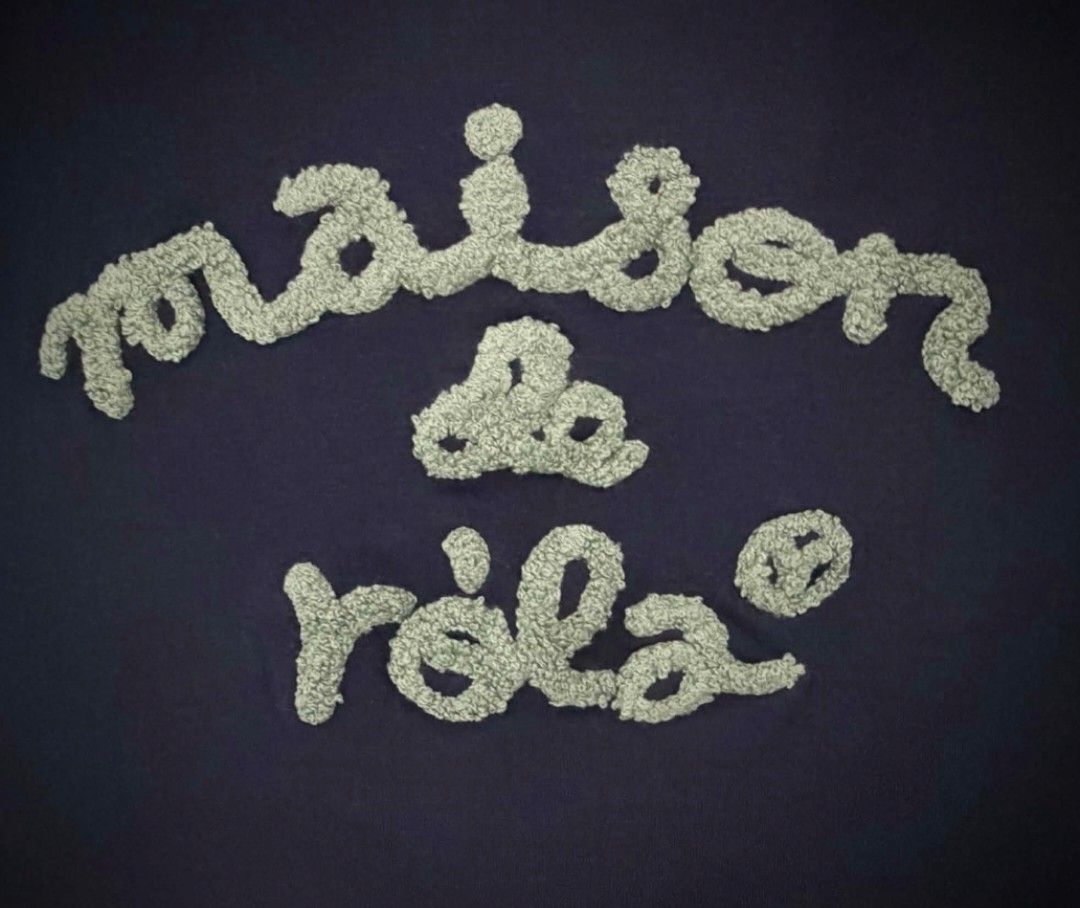 Maison Embroidered Cotton Tops (Category: Shirts) located in Quezon City. Submitted by panapton.ph (Listing ID 1465126053, Image 3). Description: FLASH SALE ONLY 300 -Brandnew Cotton Shirts -Actual item post -Size fit 34 to 42bust -22inches Length -Short-sleeve, crewneck daily t-shirt in a navy colorway. -​Features a textured "maison de rola" graphic logo embroidery created with a distinct hand-stitch/bouclé technique..