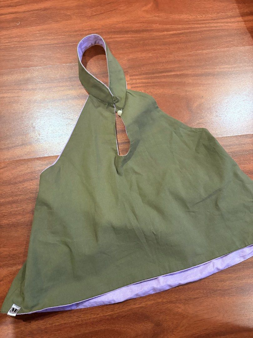 Malaya Club Reversible Linen Halter (Popup Exclusive Colourway!) (Category: Sleeveless) located in Quezon City. Submitted by lockedoutofwandererpp (Listing ID 1465036940, Image 2). Description: - Girl World Limited Popup Version! 4-in-1 reversible design: Olive Green on one side, Lilac/Light Purple on the other - Size: S/M - Condition: Worn only once; Rfs: Not bagay pala! Impulse buy 😭.