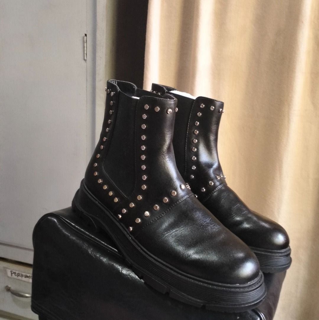 MALL GOTH STUDDED ANKLE BOOTS (Category: Boots) located in Caloocan City. Submitted by pretaporter.2026 (Listing ID 1460241065, Image 2). Description: The ultimate staple for your alt wardrobe. These feature heavy silver stud detailing along the seams and straps, a sleek round toe, and a chunky, rugged sole. Perfect for full mall goth, traditional punk, or edgy cyber aesthetics. Pairs perfectly with oversized fishnets, cargo skirts, or pleated pl