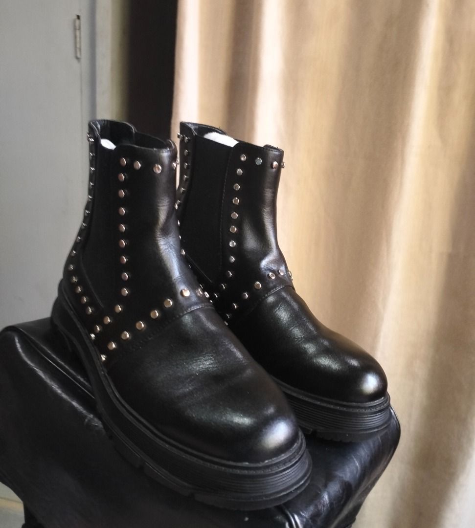 MALL GOTH STUDDED ANKLE BOOTS (Category: Boots) located in Caloocan City. Submitted by pretaporter.2026 (Listing ID 1460241065, Image 1). Description: The ultimate staple for your alt wardrobe. These feature heavy silver stud detailing along the seams and straps, a sleek round toe, and a chunky, rugged sole. Perfect for full mall goth, traditional punk, or edgy cyber aesthetics. Pairs perfectly with oversized fishnets, cargo skirts, or pleated pl