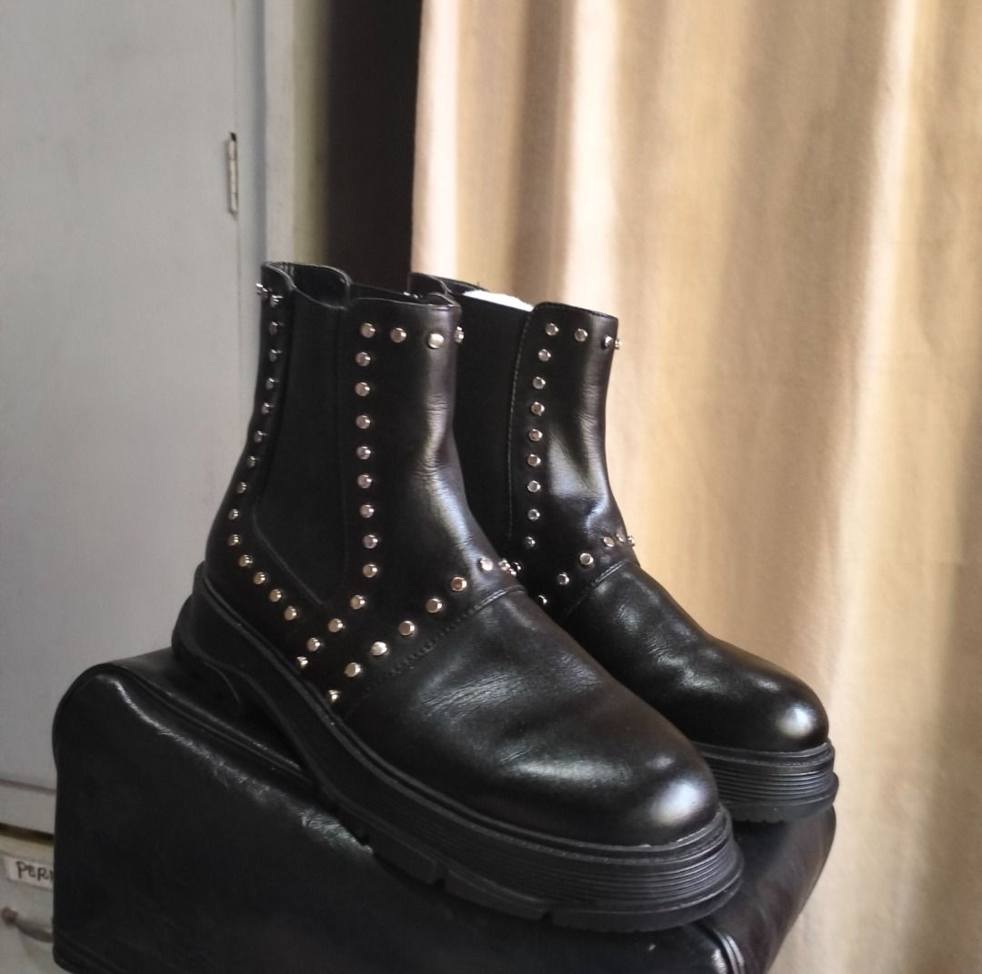 MALL GOTH STUDDED ANKLE BOOTS (Category: Boots) located in Caloocan City. Submitted by pretaporter.2026 (Listing ID 1460241065, Image 3). Description: The ultimate staple for your alt wardrobe. These feature heavy silver stud detailing along the seams and straps, a sleek round toe, and a chunky, rugged sole. Perfect for full mall goth, traditional punk, or edgy cyber aesthetics. Pairs perfectly with oversized fishnets, cargo skirts, or pleated pl