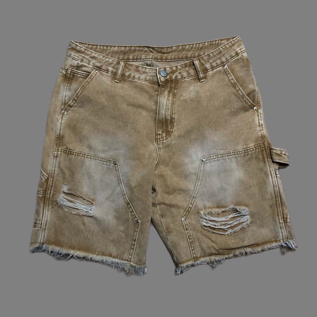Manfinity Brown Distressed Carpenter Denim Shorts Size M (Category: Shorts) located in Dasmarinas. Submitted by johnlloydm99208 (Listing ID 1465099349, Image 1). Description: - Brand: Manfinity - Size: Medium - Color/Wash: Brown denim with acid wash finish and natural fading - Details: Front distressing, raw cut-off frayed hems, utility pockets, and hammer loop - Closure: Button fly - Style: Great streetwear piece for casual outfits.