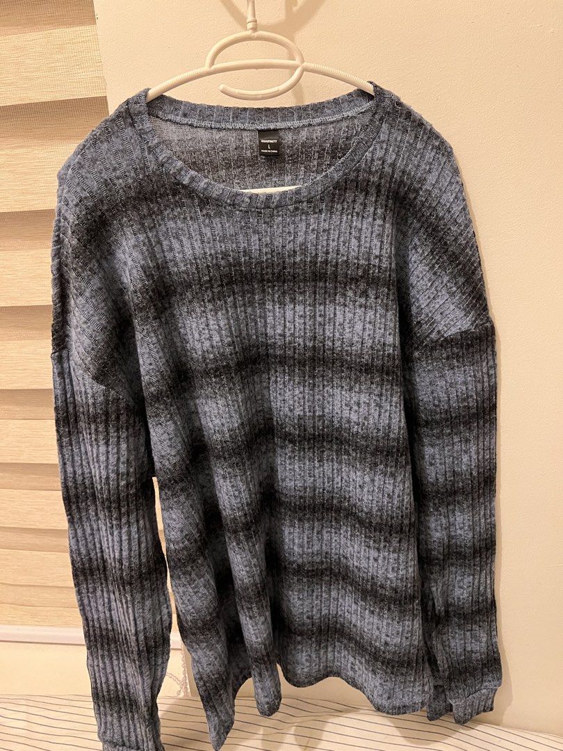 Manfinity Ribbed Knit Striped Long Sleeve Sweater Size L (Category: Longsleeves) located in Las Pinas. Submitted by basicapparel_mnl (Listing ID 1465101596, Image 1). Description: - Brand: Manfinity - Style: Blue and black striped knitted sweater - Size: Large (tag attached at inner neckline) - Details: Textured ribbed fabric, crew neck collar, and relaxed drop-shoulder cut - Condition: Brand new, cozy and perfect for everyday wear.