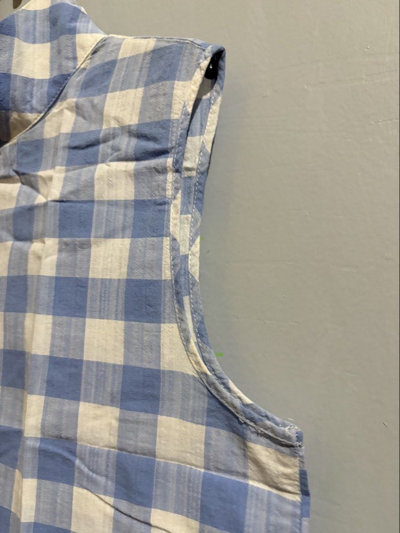 MANGO Blue and White Gingham Sleeveless Mock Neck Blouse (Category: Sleeveless) located in Manila. Submitted by margascloset_ (Listing ID 1465076401, Image 3). Description: MANGO Blue and white gingham pattern sleeveless design with mock neckline and structured collar - can fit XXS/XS - Back keyhole opening with a single small button closure - Condition: lightly used & pre-loved RFS: Decluttering MOD: J&t, LBC, Lalamove, Grab MOP: Gcash / Bank.