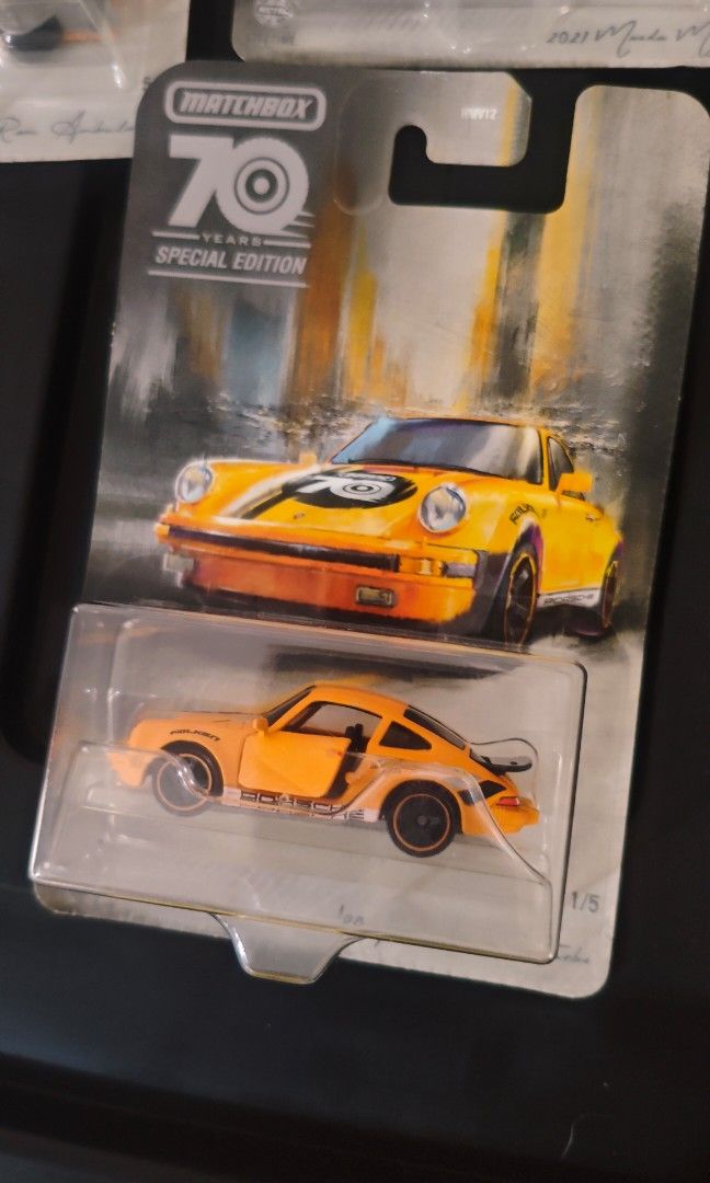 Matchbox 70 years anniversary special edition set (Category: Vehicle & Diecast Models) located in Pasig City. Submitted by mxn_jp (Listing ID 1382291488, Image 3). Description: Matchbox 70 years special edition (orange version) Scale: 1:64 Released: 2023 Set includes: '80 Porsche 911 Turbo 2020 Corvette GMC Hummer EV 2021 Mazda MX-30 2016 Ram Ambulance Highly collectible item Best feature: all cars have its own moving parts (doors, hood etc.) Str