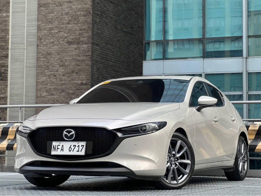 Mazda 3 2.0 (A) (Category: Used Cars) located in Makati City. Submitted by maby_latido05 (Listing ID 1464973843, Image 3). Description: 2023 Mazda 3 HEV 2.0 Fastback AT Gas 8k mileage only! 278K ALL-IN DP‼️🔥 (Chattel & Insurance included) 2yrs - 50,400 3yrs - 36,400 4yrs - 30,200 5yrs - 26,800 *Higher cashout will lower monthly payments FREE Transfer of Ownership FREE Detailing FREE Autoloan Processing FREE Full Vehicle Scanning ✅️ NO MILEAGE TA