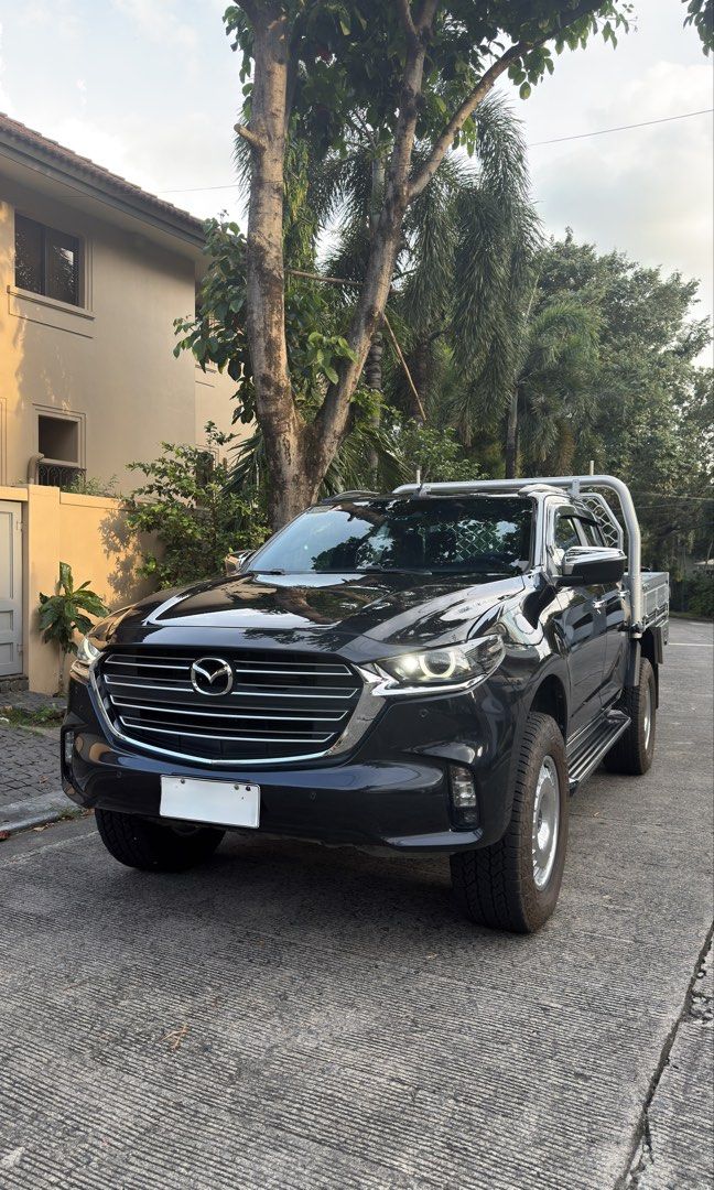 Mazda BT 50 4x4 Pangolin II Auto (Category: Used Cars) located in Muntinlupa City. Submitted by daimler (Listing ID 1448132989, Image 3). Description: 2023 Mazda BT50 Pangolin edition II 4x4 Top of the line Full casa maintained complete casa records 70tkm New Aluminum bed Australian specs style New OME old man emu shocks 2inch lift Full options Leather seats Automatic diesel 285/65/18 maxxis tires Original paint ₱1.325m php or best offer trade ok
