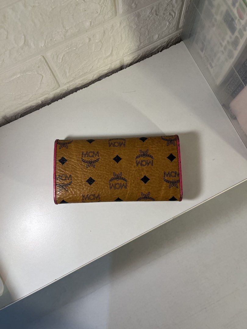 MCM Tri-fold Long Wallet Visetos Monogram Pink (Category: Luxury Bags & Wallets) located in Muntinlupa City. Submitted by pique.unique (Listing ID 1465048826, Image 2). Description: MCM Visetos monogram coated canvas wallet Authenticity Guaranteed Pristine Condition No Flaws Check Photos to Appreciate the item Price: 2,200 Dm If Interested 📩 Location: Muntinlupa City .
