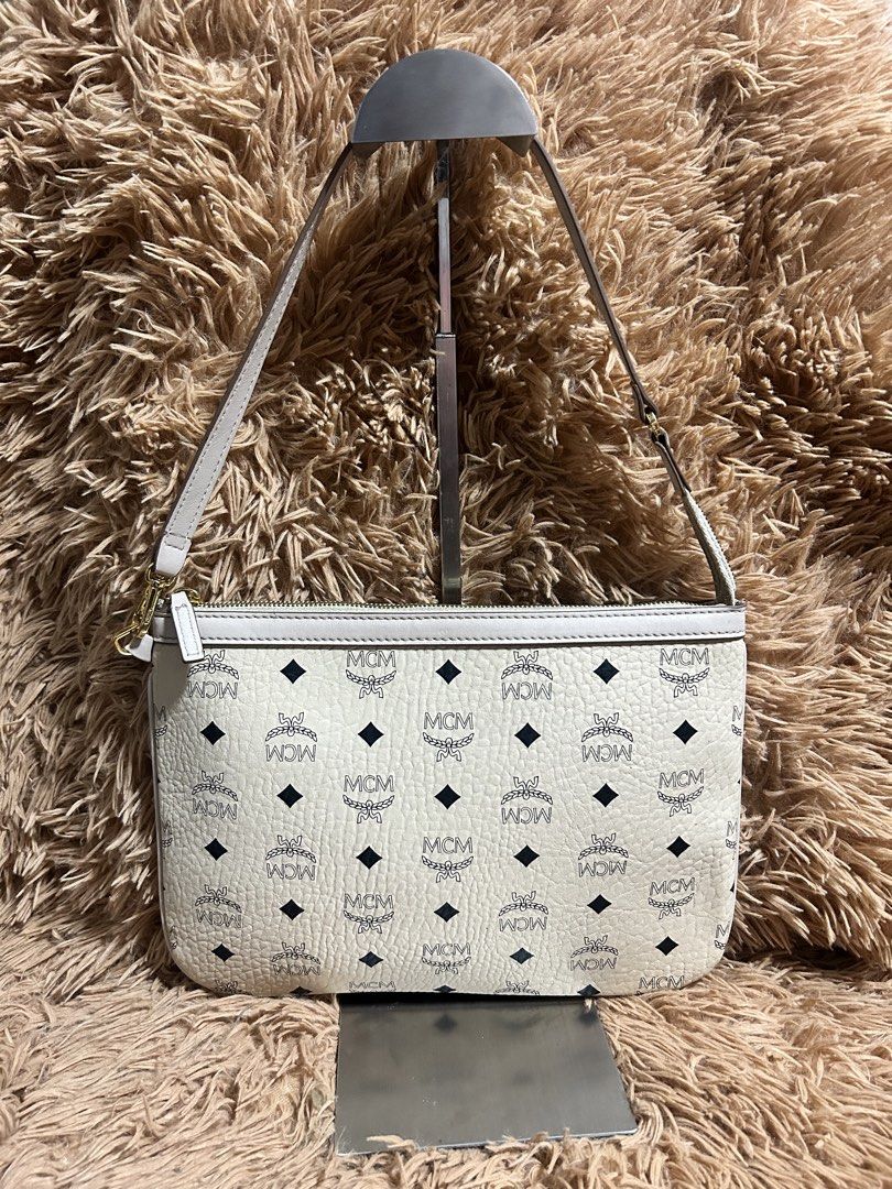 Mcm visetos Kili Bag (Category: Luxury Bags & Wallets) located in Iloilo. Submitted by thrift-to-thrift-ukay (Listing ID 1465125247, Image 1). Description: Authentic Mcm Visetos Kili-kili Bag Size Small Rank A Condition Issue cut white code .