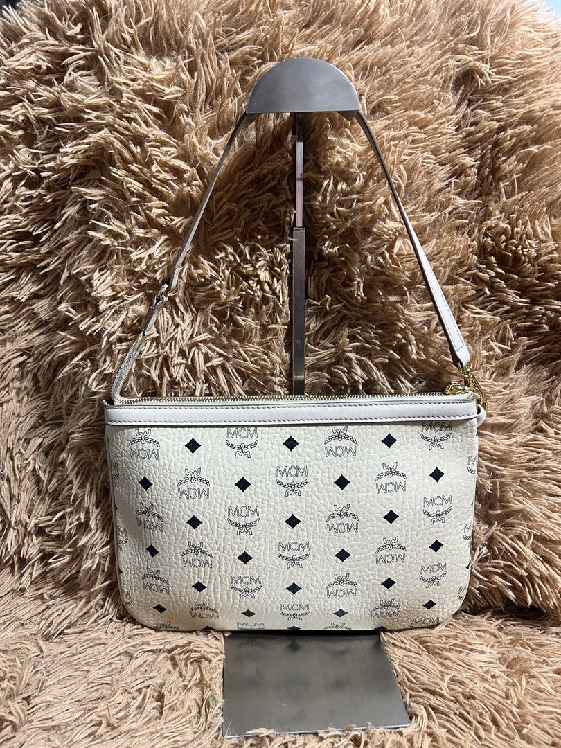 Mcm visetos Kili Bag (Category: Luxury Bags & Wallets) located in Iloilo. Submitted by thrift-to-thrift-ukay (Listing ID 1465125247, Image 3). Description: Authentic Mcm Visetos Kili-kili Bag Size Small Rank A Condition Issue cut white code .