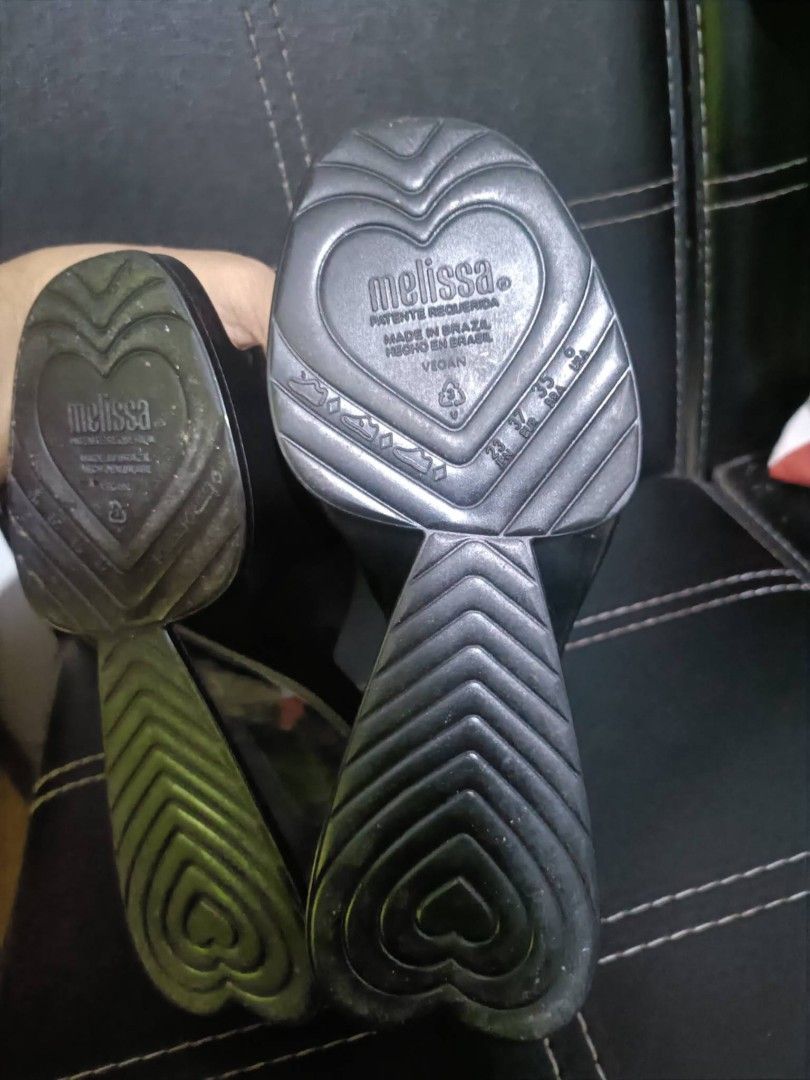 Melissa Queen V Black Mules Wedge Shoes (Category: Flats & Sandals) located in Manila. Submitted by earlco (Listing ID 1465058232, Image 3). Description: - Brand: Melissa - Style: Wedge mules with open toe - Color: Black with clear wedge heel - Size: US 7 / EUR 38 - Material: Vegan (Made in Brazil) - Inclusions: Original black box included.
