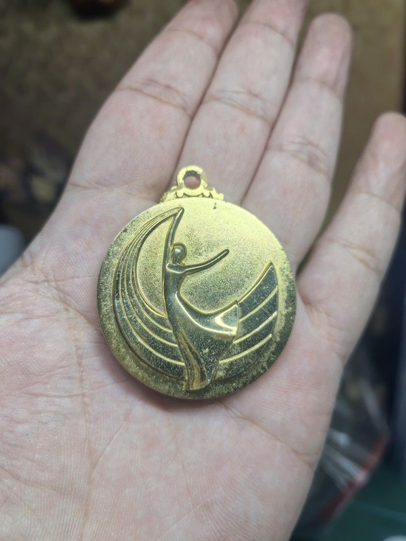 Metal Relief Trophy Insert - Dancer Gold-Tone (Category: Vintage Collectibles) located in Cebu City. Submitted by dudes_villanueva (Listing ID 1464973299, Image 1). Description: Metal Relief Trophy Insert - Dancer Gold-Tone In excellent condition Size: 40mm in diameter.