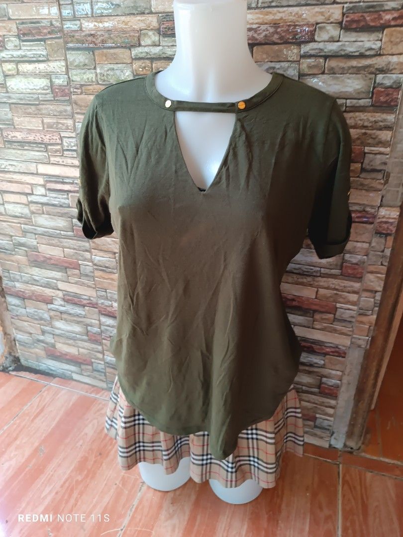 Michael Kors Green T-Shirt (Category: Shirts) located in Gapan. Submitted by thrift2heaven (Listing ID 1465089502, Image 1). Description: - Brand: Michael Kors - Size: Medium (M) - Color: Green - Neckline: V-neck with chic gold-tone hardware accents - Sleeves: Short sleeves with rolled cuffs - Fit: Classic fit with good stretch - Material/Origin: Clean fabric, made in Vietnam - Condition: Excellent, easy to pair with any casual outfit.