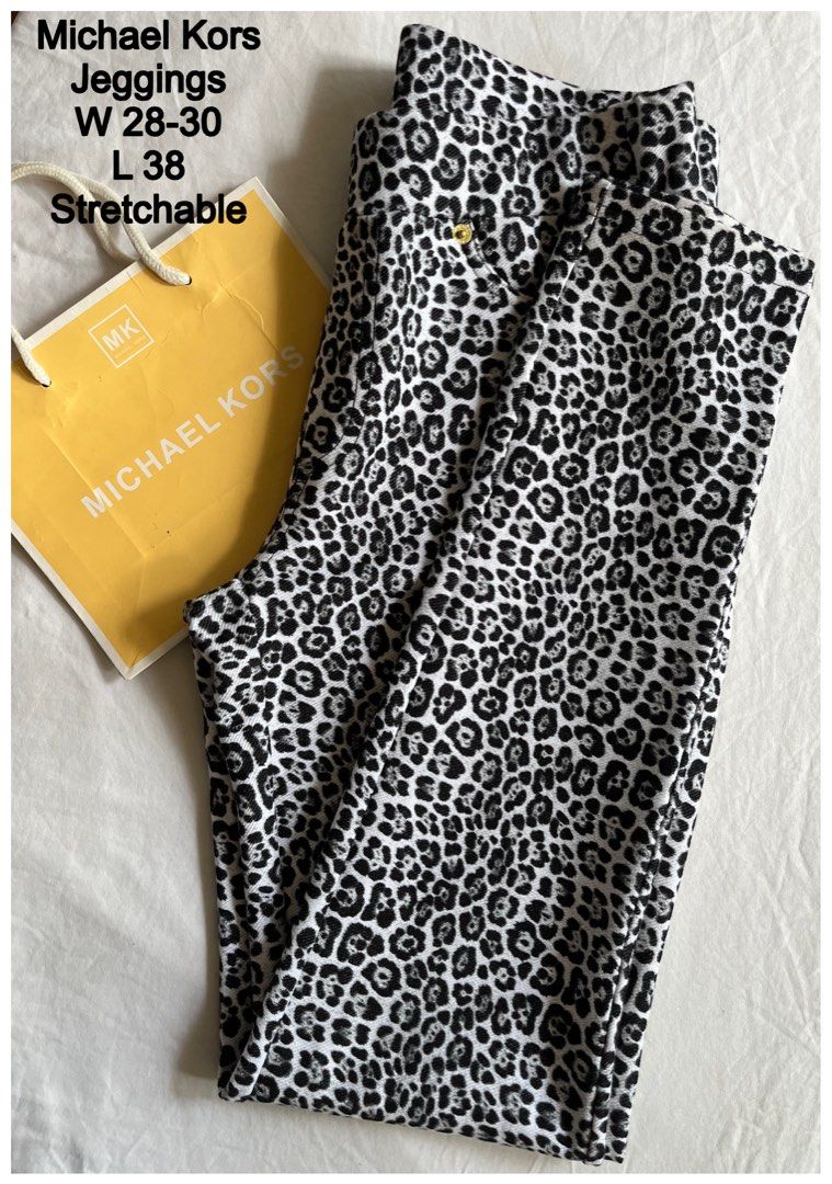 Michael Kors Leopard Print Stretch Jeggings (Category: Jeans) located in Cebu City. Submitted by purgemycloset (Listing ID 1465099238, Image 1). Description: - Brand: Michael Kors - Size: S - Design: Bold black and white animal print - Fit & Style: Super stretchy, pull-on style - Details: Classic five-pocket design with branded gold-tone hardware rivets - Condition: Clean inside and out.