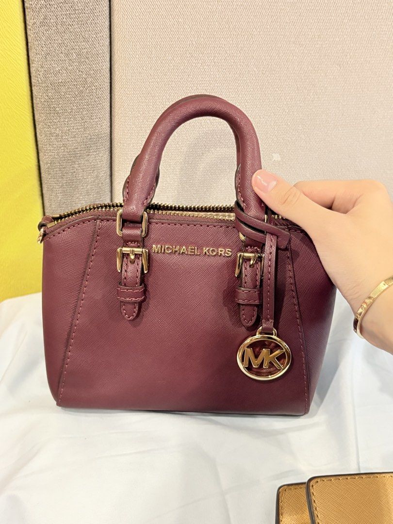 Michael Kors Maroon Mini vintage bag never used authentic (Category: Cross-body Bags) located in Manila. Submitted by collectclub (Listing ID 1465051101, Image 3). Description: never used authentic pm for more photos has long strap loc manila.