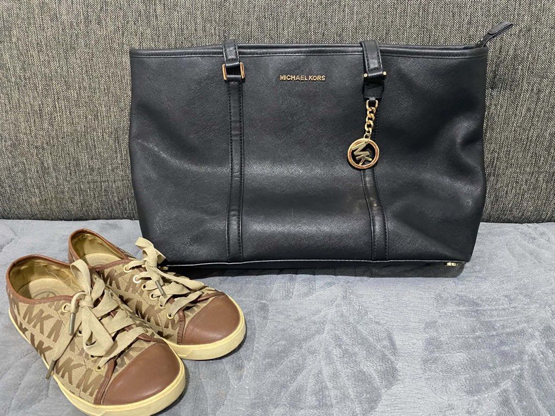 Michael Kors Monogram Sneaker Size 7 (Category: Tote Bags) located in Manila. Submitted by harvey2417 (Listing ID 1465116023, Image 2). Description: - Michael Kors monogram sneakers Size 7 - Sneakers: Brown monogram fabric, leather toe caps, and wide laces - Great for daily outfits and effortless styling - Special bundle deal - grab both items together now! - Used Once, from USA ORIGINAL PRICE ₱17k.
