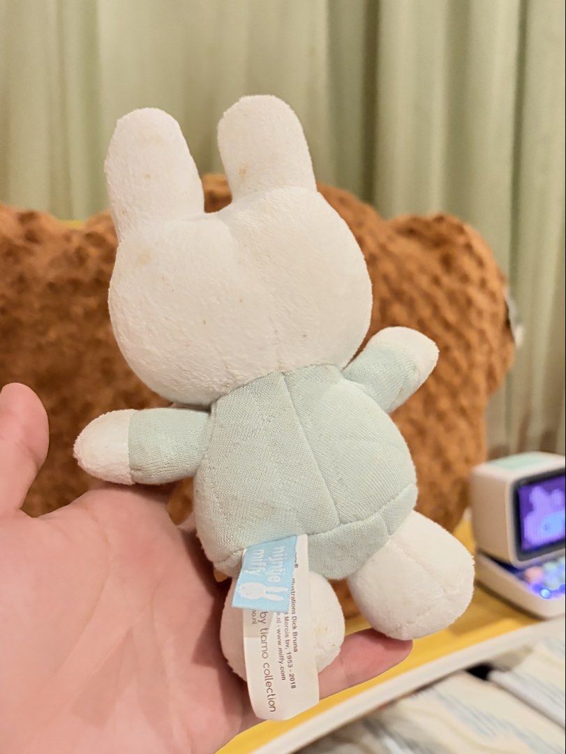 Miffy Plush (Rattle) (Category: Plushies & Soft Toys) located in Caloocan City. Submitted by miffuph (Listing ID 1465127428, Image 3). Description: - 100% Authentic Miffy plush from the Tiamo collection - Outfit: Light mint green quilted dress with a white collar - Condition: Brand new with original tag attached; has minor storage discoloration on the top of the head and ears - Material: Super soft and huggable all around - Perfect addition to yo