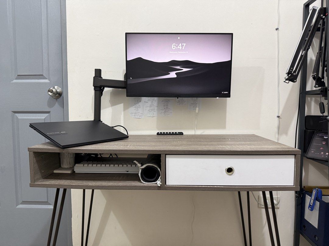 Minimalist Computer/Study Table (Category: Tables & Sets) located in Manila. Submitted by kensthingz (Listing ID 1465064670, Image 1). Description: Selling my Ash & White Computer Table. Clean and minimalist design, perfect for gaming/PC setups, studying, or home office use. * Size: 100 × 48 × 76.5 cm (L × W × H) * Solid and sturdy — no wobbles * Metal legs * Metal cabinet/drawer slides for smooth operation * Built-in drawer + open storage compar