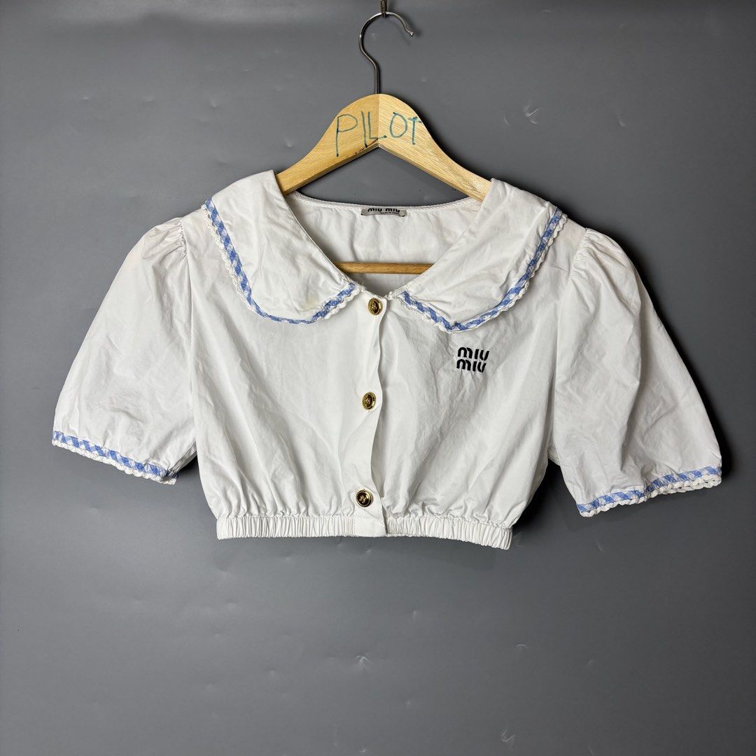 Miu Miu Crop top (Category: Blouses) located in Dagupan City. Submitted by thrifted_by.pilott (Listing ID 1464988931, Image 1). Description: Size/Dimes: Length 12.5 Width 14.5 Issue: Need wash, check last pic Very Good Condition Complete tags Color may very due to lighting Color Rate: 10/10 Price: ₱ 1299 + sf sustainable, stylish, and budget-friendly! DM for more pics or questions. .