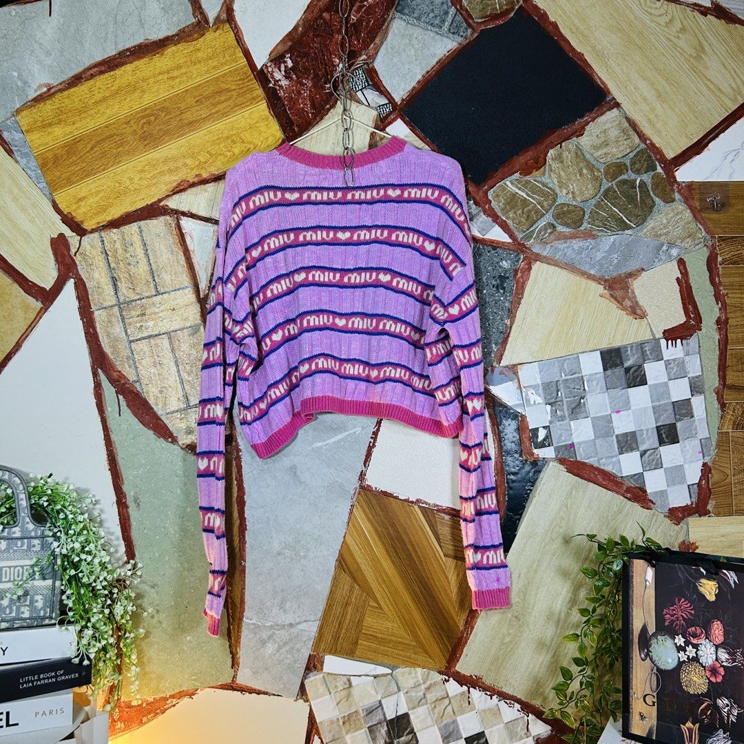 Miu miu knit (Category: Luxury Apparel) located in Baguio. Submitted by kckc_luxury (Listing ID 1465105960, Image 2). Description: 🌸 TINY PINK SPOTS ARE LENS DAMAGE, NOT CLOTH STAINS ————————— ❗️KINDLY READ BEFORE MAKING AN OFFER❗️ LISTING DETAILS size:M width x length (inches):25x20 condition: Good condition --- MOP: Gcash / BPI MOD: J&T / JRS LOCATION: Baguio City --- NOTE: • Manage your expectations • Photos did not go under any edit but colo