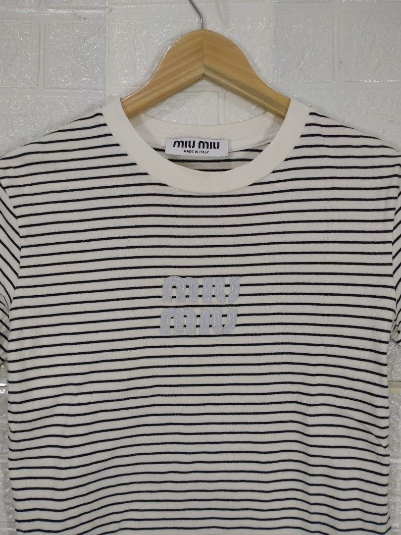 MIU MIU TEE SHIRT (Category: Luxury Apparel) located in Baguio. Submitted by dansteals (Listing ID 1465129341, Image 2). Description: 22 X 17 SMALL.