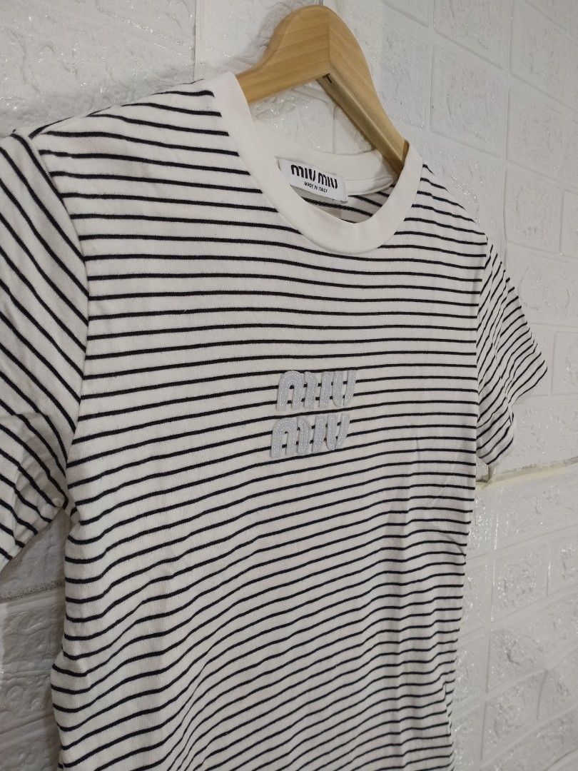 MIU MIU TEE SHIRT (Category: Luxury Apparel) located in Baguio. Submitted by dansteals (Listing ID 1465129341, Image 3). Description: 22 X 17 SMALL.