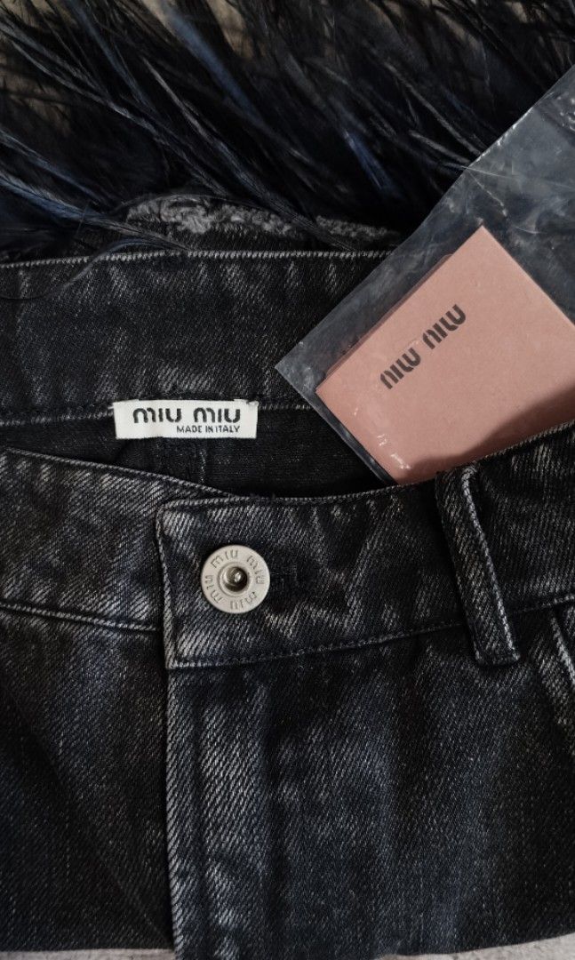 Miumiu Denim with feather trim Mini Skirt (Category: Luxury Apparel) located in Caloocan City. Submitted by modishthriftstore (Listing ID 1465130680, Image 2). Description: Authentic @miumiu denim with feathers trim mini skirt* With hangtag ❤Medium Waist:28-29 Hips:19" Width L: 15 loc: Rainbow village 5 North Caloocan.