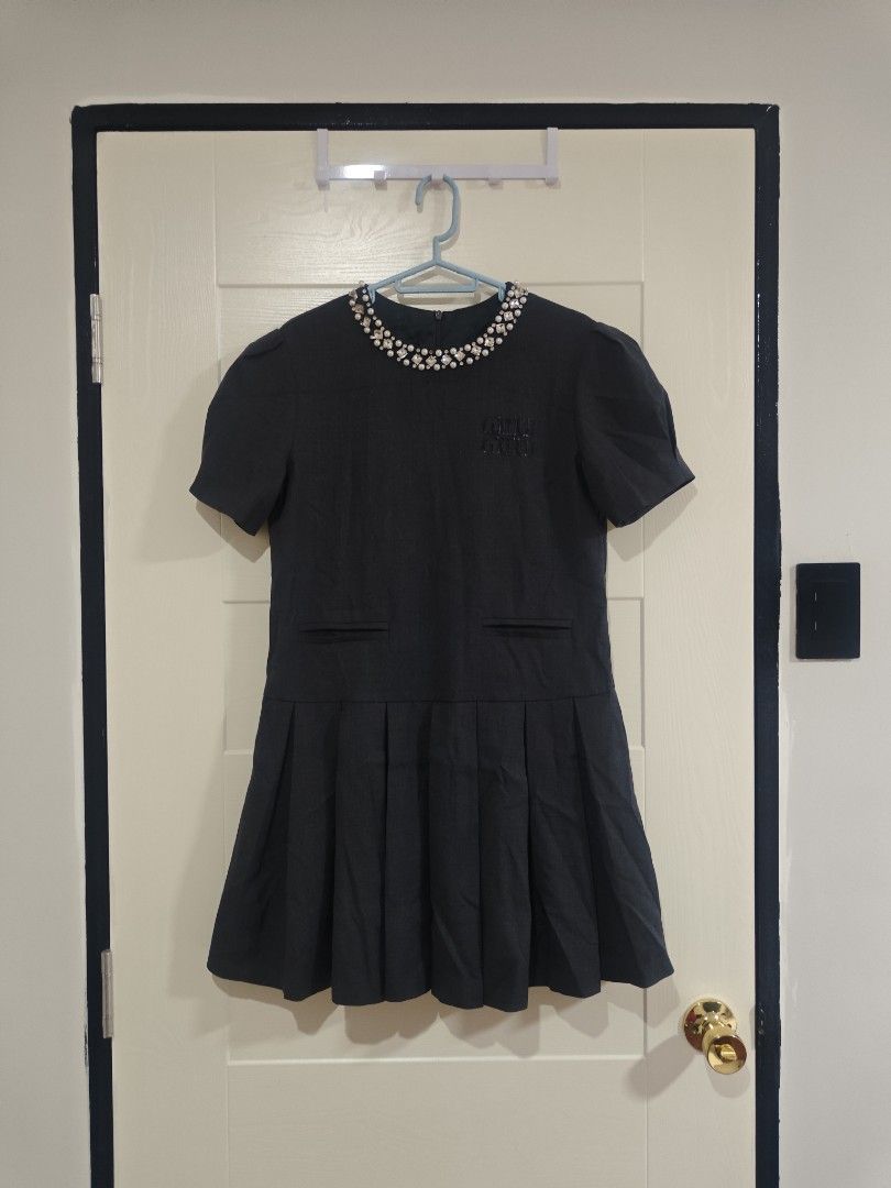 Miumiu Gray Dress (Category: Luxury Apparel) located in Santa Rosa. Submitted by sassycollection. (Listing ID 1465017936, Image 1). Description: Decluttering luxury dressed Gray color Studded in neck collar Skirt style Innerlining inside Can fit to small up to medium.