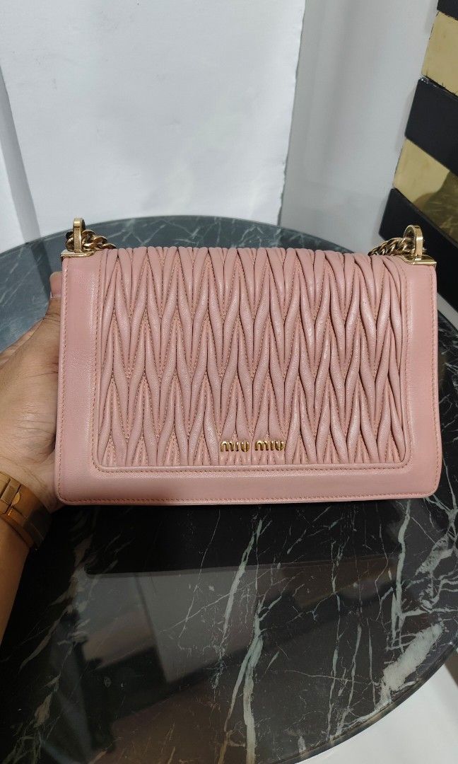 Miumiu two way💯 (Category: Cross-body Bags) located in Andop. Submitted by dailyluxxurybrands (Listing ID 1464986485, Image 2). Description: authentic 💯 Miumiu two way in good condition normal signe of use.