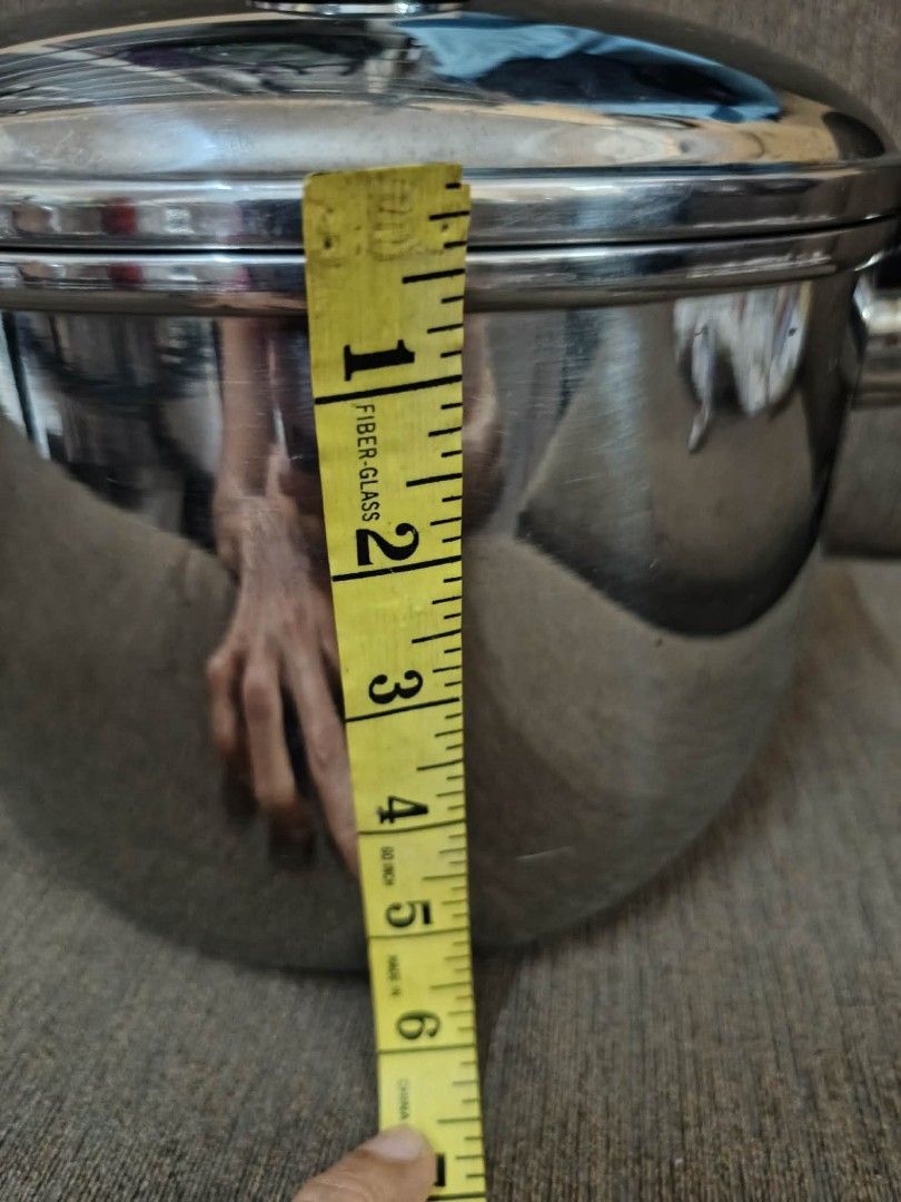 Miyaco Objet 3-Layer Cookware Stainless Steel Pot with Lid (Category: Cookware & Accessories) located in Caloocan City. Submitted by chonadura91470 (Listing ID 1465157718, Image 2). Description: - Brand: Miyaco Objet - Material: Premium stainless steel with a shiny finish - Dimensions: ~9 inches top opening, ~6 inches depth - Features: Matching lid with black handles and top knob - Condition: Brand new/unused pot with solid build; original box sh