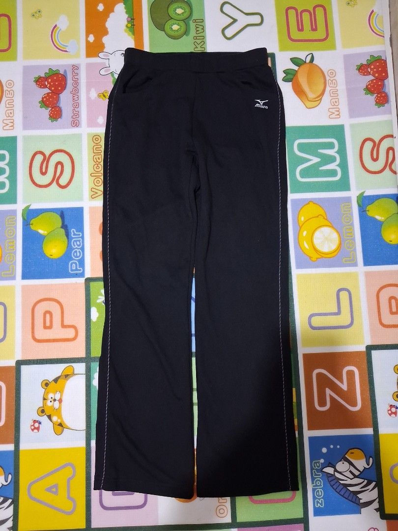 Mizuno Black Athletic Pants (Category: Activewear) located in Manila. Submitted by rossthrift (Listing ID 1465132828, Image 2). Description: - Brand: Mizuno - Color: Classic black with white logo near the hip - Design: Stylish stitching details along the sides - Material: Soft and comfortable fabric - Versatility: Ideal for workouts, sports, or casual daily lounging.