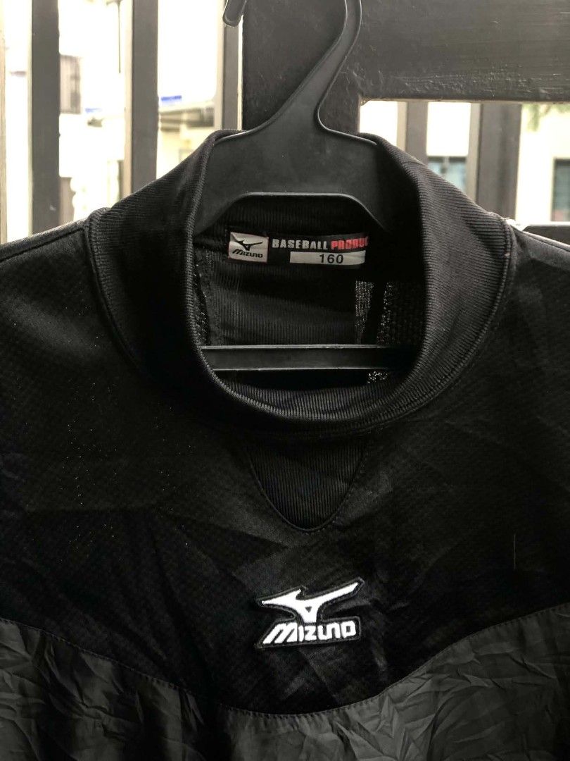 mizuno vintage windbreaker (Category: Coats, Jackets and Outerwear) located in Manila. Submitted by hollysansh (Listing ID 1465139071, Image 2). Description: Authentic Mizuno athletic top from the 2000s era • Mock neck design • lightweight windbreaker fabric • Classic chest logo • relaxed fit • Timeless black — easy to style! Great condition — no holes, rips, or stains.